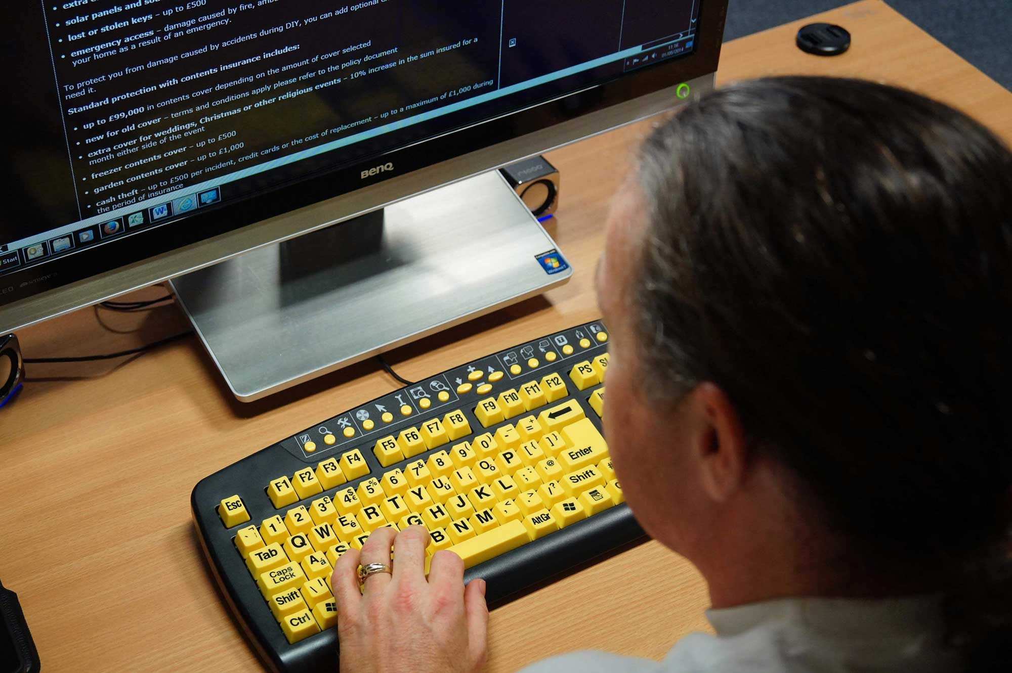 DAC Staff member using high visibility Keyboard and inverted display colours